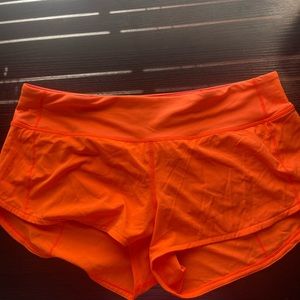 Bright orange speed up shorts 2.5